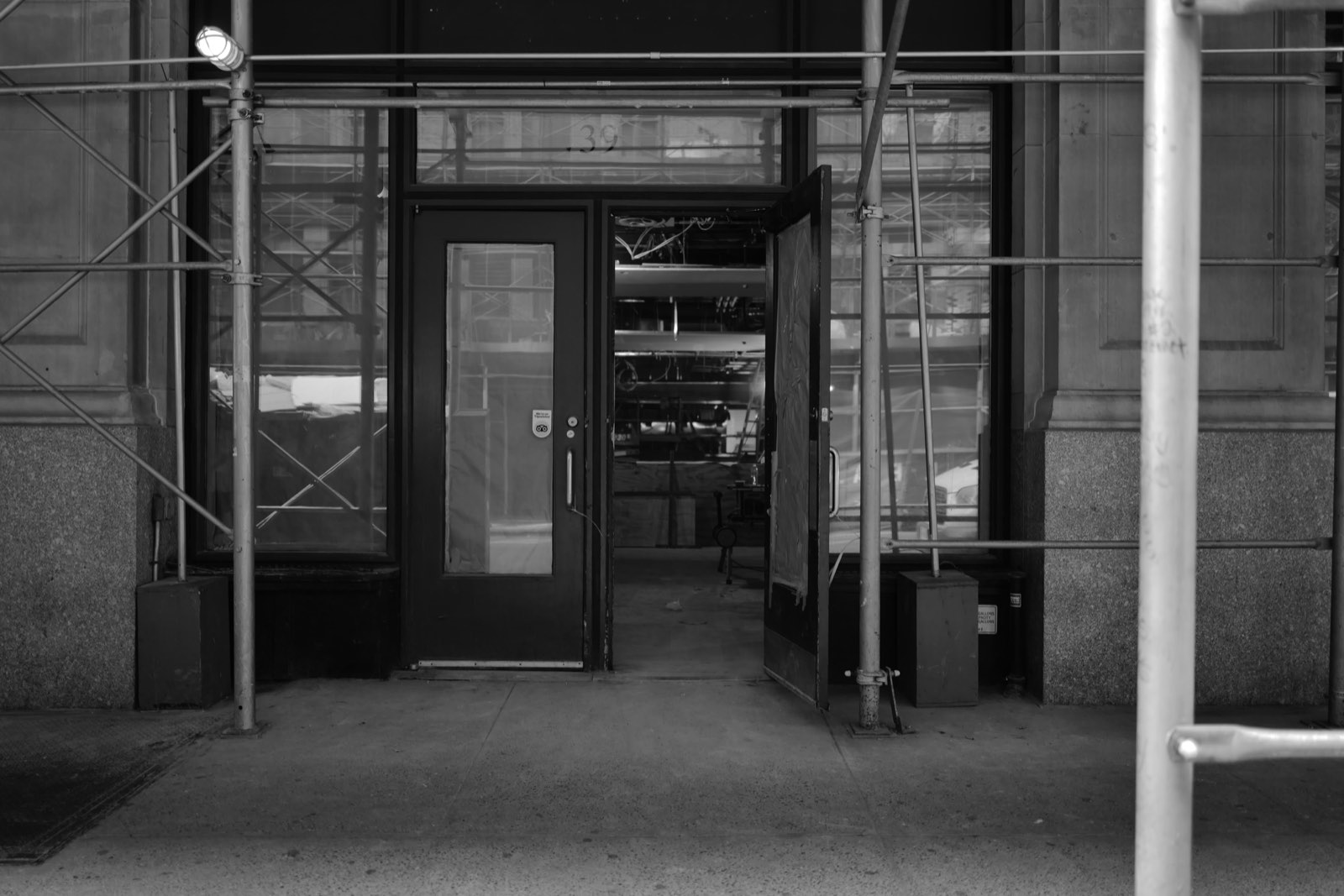 The doorway of the building during the restoration, one door open