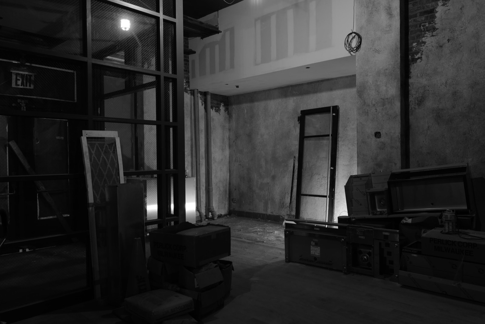 The double height room and the mezzanine above it